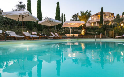 Le Due Ville: Water, Sky, Swimming Pool, Building, Tree, Plant, Arecales, Umbrella, Outdoor Furniture, Leisure