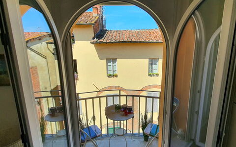 Sui Tetti Di Lucca: Building, Property, Window, Blue, Door, Lighting, House, Interior Design, Sky
