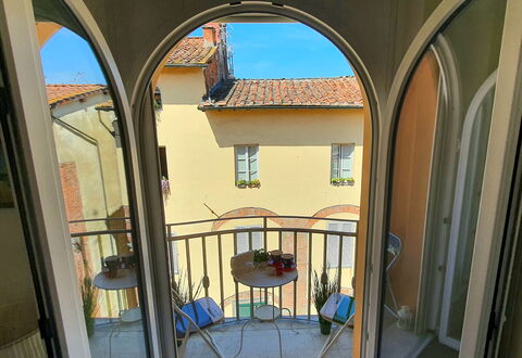Sui Tetti Di Lucca: Building, Property, Window, Blue, Door, Lighting, House, Interior Design, Sky