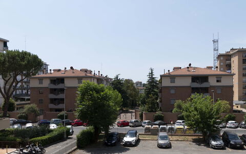 Novoli Suite Apartment: Sky, Car, Plant, Wheel, Vehicle, Building, Window, Tree