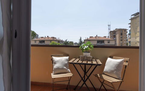 Novoli Suite Apartment: Plant, Property, Furniture, Flowerpot, Building, Houseplant, Table, Wood, Sky, Window
