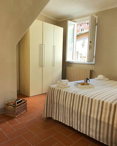 Loft Lucca: Furniture, Property, Cabinetry, Window, Comfort, Wood, Interior Design, Drawer, Bed Frame, Building