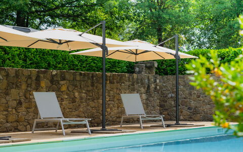 Villa Sant'anna: Water, Plant, Furniture, Property, Umbrella, Swimming Pool, Shade, Tree, Outdoor Furniture, Chair