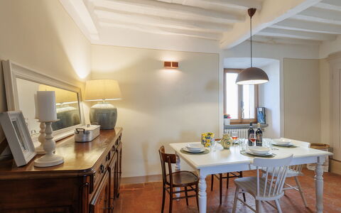 Appartamento Mancini: Table, Furniture, Property, Wood, Chair, Cabinetry, Building, Lighting, Interior Design