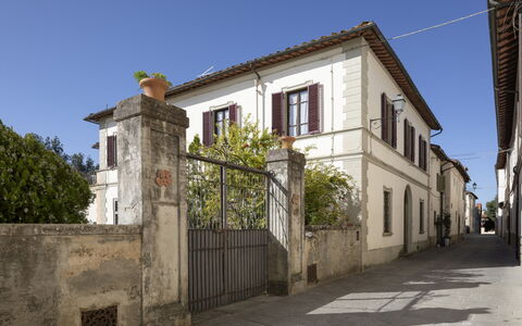 Villa La Cicogna Tuscany: Sky, Window, Building, Plant, Tree, House, Door, Urban Design, Residential Area, Road Surface