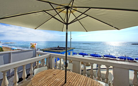 Casa Riva: Water, Sky, Property, Table, Furniture, Umbrella, Shade, Azure, Outdoor Furniture, Wood