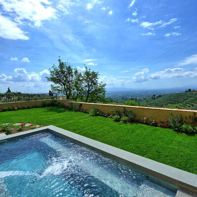 Casa Lionardo: Cloud, Sky, Water, Plant, Property, Azure, Natural Landscape, Grass, Swimming Pool, Tree