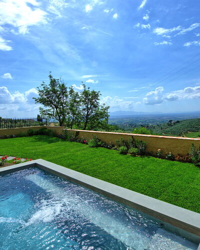 Casa Lionardo: Cloud, Sky, Water, Plant, Property, Azure, Natural Landscape, Grass, Swimming Pool, Tree