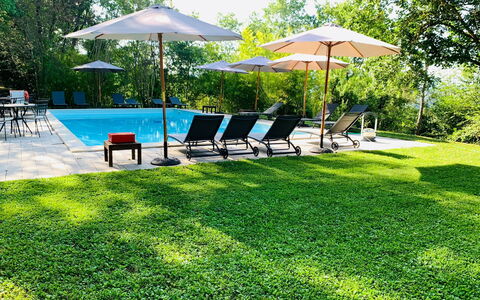 Borgo Al Castello: Plant, Property, Furniture, Shade, Tree, Outdoor Furniture, Land Lot, Water, Umbrella, Leisure