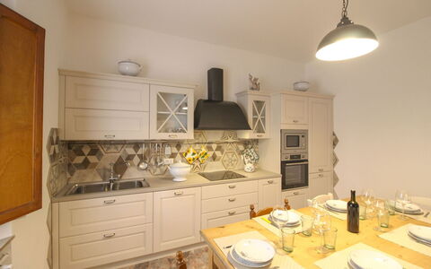 Casa Angela: Furniture, Interior Design, Flooring, Kitchen, Wood, Floor, Countertop, Ceiling, Light Fixture, Room