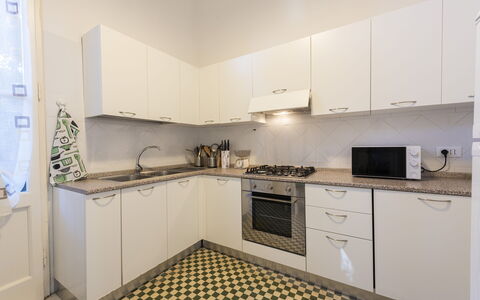 Villa Marconi: Cabinetry, Countertop, Kitchen Stove, Kitchen Appliance, Kitchen, Sink, Home Appliance, Building, Wood, Interior Design