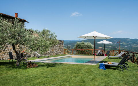 Casa San Piero: Water, Sky, Plant, Swimming Pool, Shade, Outdoor Furniture, Tree, Umbrella, Leisure, Building