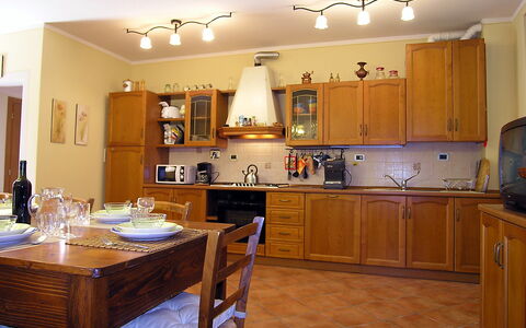 Villino Setteponti: Cabinetry, Furniture, Countertop, Table, Home Appliance, Wood, Kitchen, Interior Design, Lighting, Kitchen Appliance