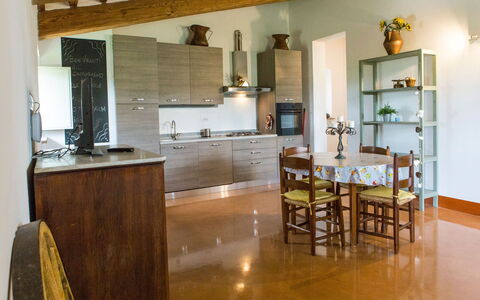 Villa Tavernacce: Countertop, Property, Cabinetry, Table, Furniture, Wood, Kitchen, Interior Design, Kitchen Appliance, Chair