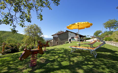 Villa Renaccio: Plant, Sky, Property, Tree, Land Lot, Shade, Outdoor Furniture, Leisure, Natural Landscape, Wood