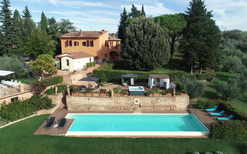 Villa Tresanti: Cloud, Plant, Sky, Property, Building, Green, Tree, Water, Swimming Pool, Window