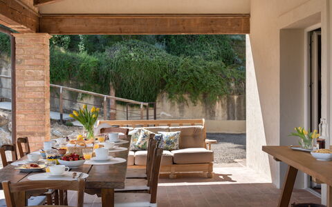 Villa Noemi: Table, Furniture, Plant, Chair, Building, Shade, Wood, Lighting, Interior Design, Architecture