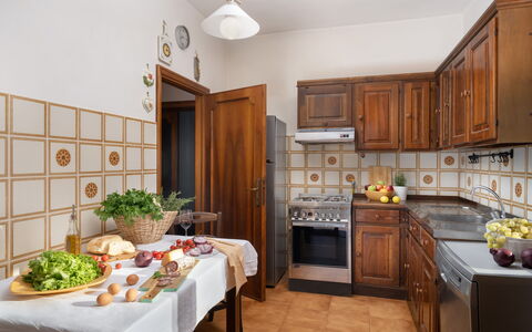 Residenza la Casuccia: Food, Cabinetry, Countertop, Property, Table, Wood, Kitchen, Lighting, Interior Design, Tableware