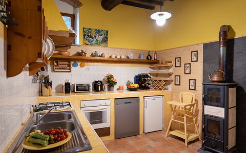 Villa La Vigna: Property, Cabinetry, Countertop, Building, Picture Frame, Kitchen Appliance, Wood, Kitchen, Home Appliance, Interior Design