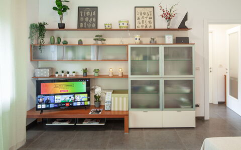 Apartment Serena - Levanto: Property, Furniture, Shelf, Television, Shelving, Orange, Interior Design, Wood, Bookcase, Cabinetry