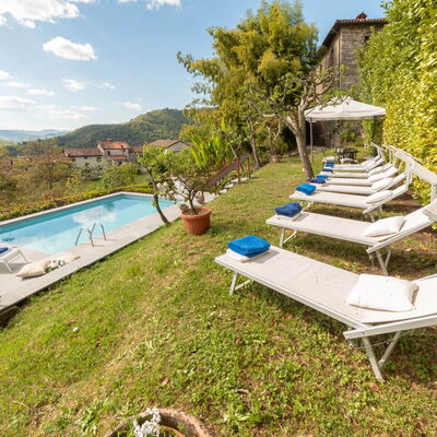 Villa In Garfagnana: Plant, Sky, Water, Cloud, Swimming Pool, Outdoor Furniture, Natural Landscape, Tree, Architecture, Leisure