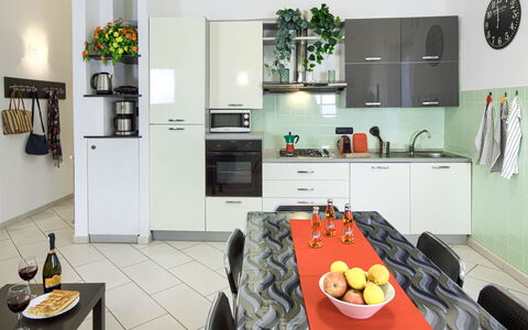 Apartment Fernanda 2 - Levanto: Food, Property, Countertop, Cabinetry, Kitchen, Kitchen Appliance, Interior Design, Home Appliance, Tableware, Orange