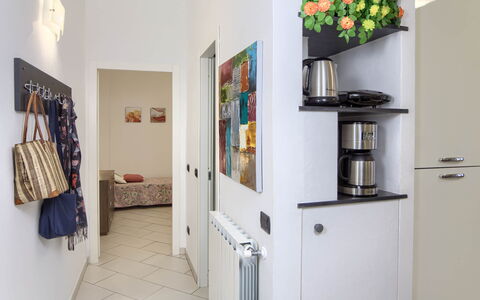 Apartment Fernanda 2 - Levanto: Property, White, Interior Design, Shelf, Shelving, Wall, Gas, Flower, Flooring, Wood