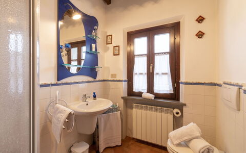 Il Borgo Apartment: Mirror, Tap, Plumbing Fixture, Sink, Property, Bathroom Sink, Bathroom, Window, Interior Design, Architecture
