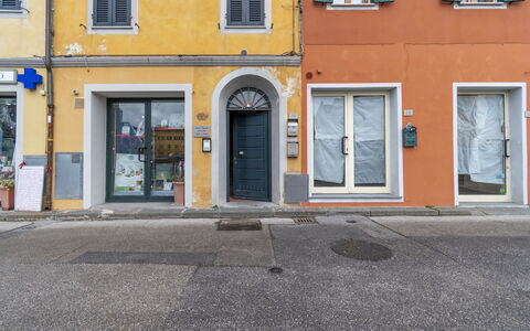 Il Borgo Apartment: Window, Door, Building, Road Surface, Yellow, Asphalt, Facade, City, Gas