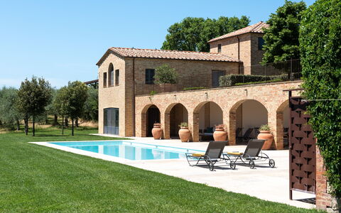 Podere D'Asso: Sky, Plant, Building, Tree, Grass, Outdoor Furniture, House, Shade, Leisure, Landscape