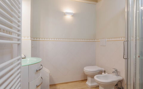 La Terrazza Sulla Valle: Plumbing Fixture, Cabinetry, Toilet, Building, Bathroom, Wood, Lighting, House, Interior Design, Flooring