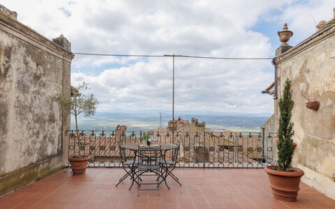 La Terrazza Sulla Valle: Sky, Cloud, Property, Plant, Building, Flowerpot, Azure, Chair, Wood, Flooring