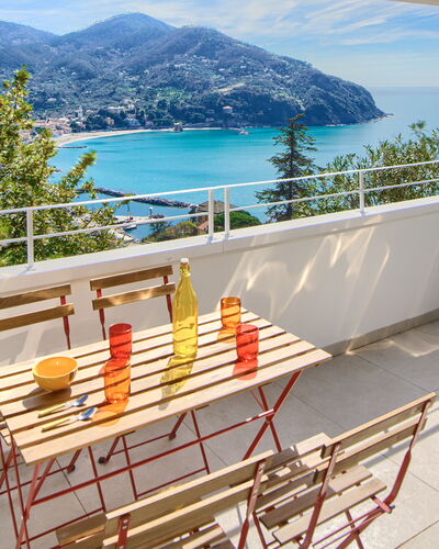 Casa Grande Mare - Levanto: Water, Sky, Building, Property, Cloud, Wood, Chair, Outdoor Furniture, Shade, House
