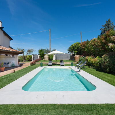 Villa Di Pillo: Plant, Sky, Water, Property, Tree, Leisure, Cloud, Swimming Pool, Grass, Residential Area