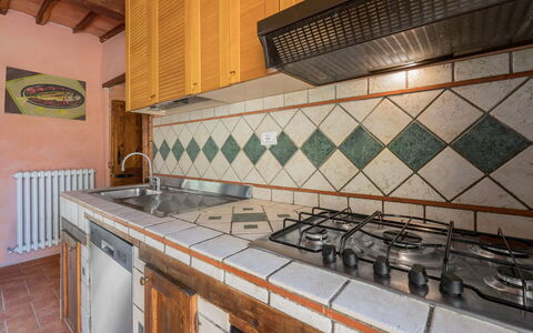 Colle Degli Ulivi - Cortona, Pool, Nature, Privacy: Property, Cabinetry, Countertop, Kitchen Stove, Wood, Kitchen, Tap, Interior Design, Building, Flooring