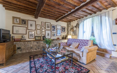 Fienile Di Fabio - Colline Fiorentine Vaiano, Tosc: Furniture, Couch, Picture Frame, Purple, Wood, Table, Interior Design, Living Room, Floor, Building