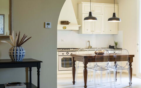 Villa Zara: Furniture, Table, Cabinetry, Building, Wood, Kitchen, Lighting, Interior Design, Shelving, Living Room