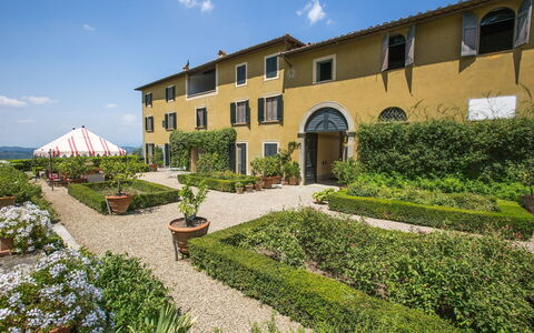 Castello Di Quarate: Plant, Cloud, Sky, Property, Window, Building, Vegetation, Land Lot, Grass, Flower