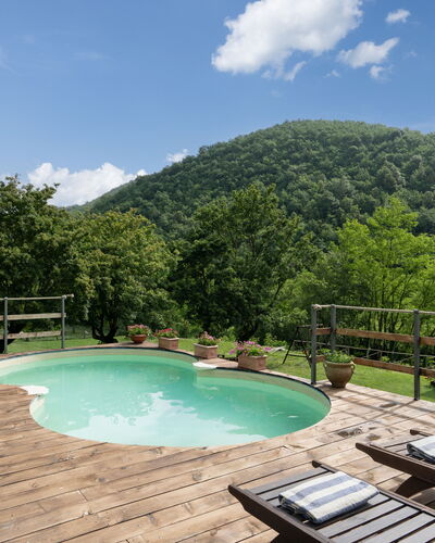 Locanda Di Alberi Without Kitchen: Cloud, Water, Sky, Water Resources, Property, Swimming Pool, Mountain, Body Of Water, Tree, Natural Landscape