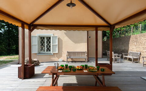 Casa Serra: Furniture, Property, Table, Building, Plant, Window, Wood, Outdoor Furniture, Shade, Interior Design