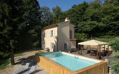 Casa Serra: Plant, Property, Building, Window, Swimming Pool, Sky, Tree, Chair, Outdoor Furniture, Wood