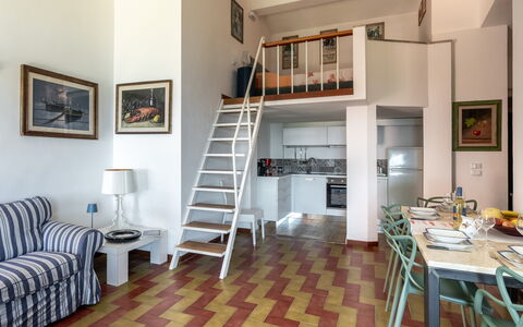 Argentarola House, Porto Santo Stefano, Seaview An: Furniture, Picture Frame, Table, Wood, Building, Chair, Flooring, Architecture, Floor, Living Room