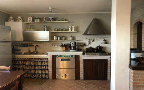 Villa Carsuga: Property, Furniture, Cabinetry, Kitchen Appliance, Kitchen, Countertop, Kitchen Stove, Home Appliance, Wood, Shelving