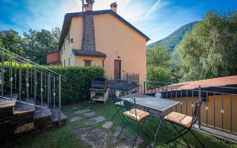 La Vecchia Fornace La Piastra Apartments - Abetone: Sky, Cloud, Property, Building, Plant, Wood, Tree, Window, Cottage, House
