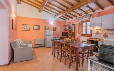 Sera Apartment: Table, Cabinetry, Wood, Interior Design, Floor, Picture Frame, Flooring, Kitchen, Living Room, Countertop