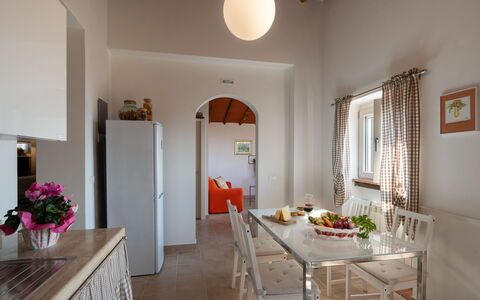 Casa Mimy: Table, Furniture, Property, Cabinetry, Wood, Window, Interior Design, Kitchen, Chair, Houseplant