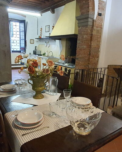 La Colonna: Table, Picture Frame, Furniture, Tableware, Chair, Building, Wood, Lighting, Dishware, Interior Design