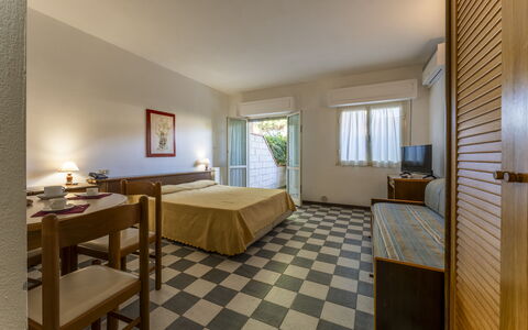 Giannella Beach Residence Apartment - Giannella, G: Furniture, Table, Picture Frame, Wood, Flooring, Floor, Houseplant, Living Room, Window