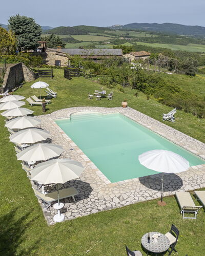 Podere Marcigliana - Radicondoli: Plant, Sky, Tree, Land Lot, Swimming Pool, Urban Design, Landscape, Leisure, Shade, Grass