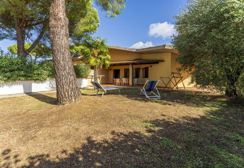 Argentario Giannella Apartment- Orbetello, Toscana: Plant, Building, Property, Sky, Window, Tree, Shade, Land Lot, House, Cloud